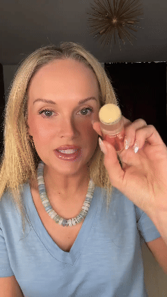 Customer demonstrating Touch and Go Hair Concealer